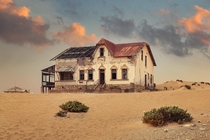 Abandoned house in the ghost town of Kolmanskop Namibia 