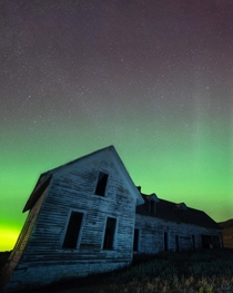 Abandoned House in Western ND framed with some Northern Lights 