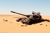 Abandoned Libyan T- tank at Ouadi Doum Chad by Guido Aldi 