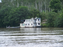 Abandoned MedicalRed Cross riverboat on the Rio Napo Ecuador I took this in  as I floated down this river on a hand made balsa raft