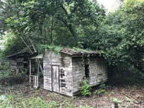 Abandoned old wood house near a river in Santa Rita province of Guanacaste in Costa Rica