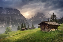 Abandoned Shacks in the Rolling Hills of Upper Grindelwald Switzerland  by Brock Whittaker