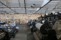Abandoned Textile Factory cotton still in the machines