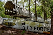 Abandoned US Air Force fighter jets and plane fuselage photo by Cindy Vasko