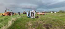 Abandoned vehicles on a stormy day South Dakota