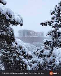 Acropolis of Athens with snowfall from this year