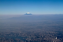 Aerial shot of Tokyo with Mount Fuji in the distance 