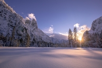 After days of heavy snow falling trees amp closed roads the storm breaks revealing a snow covered Yosemite Valley 