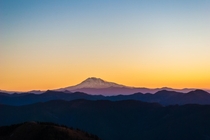 Alpenglow of Mount Adams Washington USA as seen at sunrise from Silver Star Mountain 