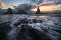 Amazing sea stacks of the Oregon Coast witness a beautiful sunset 