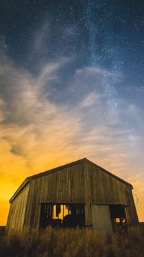 An abandoned barn under the moonlight 
