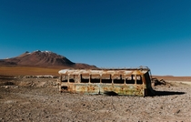 An abandoned bus in San Pedro de Atacama Chile  credit to F on Wikimedia