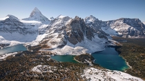 An aerial of Mount Assiniboine in the Fall Canadian Rockies Alberta taken from a helicopter  Instagram adamgearing
