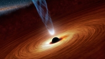 an artists illustration depicting an accretion disk of normal matter swirling around a black hole with a jet emanating from the top 