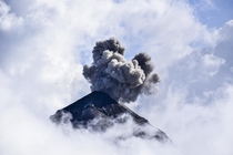 An eruption among the clouds Volcan de Fuego Guatemala x 