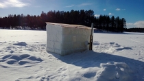 An ice sauna on a lake in Lapland Finland 
