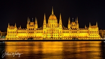 An illuminated Hungarian Parliament Building Budapest Hungary Designed by Imre Steindl 