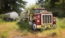An International Transtar  with tanker and trailer lies abandoned in Gig Harbor Washington by Pipe Dreamer 