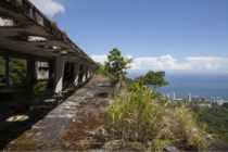 An old abandoned hotel in the mountains of Rio de Janeiro with incredible views of the ocean from its crumbling roof Brazil 