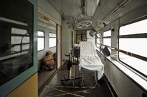 An old medical train in Germany consisting of  wagons including operating room sleeping wagon kitchen etc  locomotive By AndreasS 