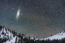 Andromeda Galaxy Setting over Snow Covered Mountains in Lassen Volcanic National Park in California 