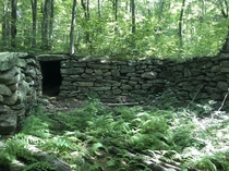 Another abandoned house foundation Sutton MA USA There is nothing through the doorway it ends with a giant stone