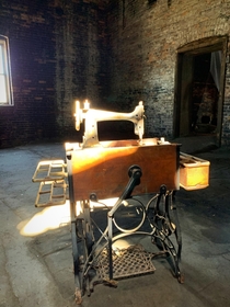 Antique sewing machine in an abandoned building