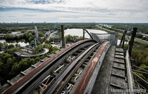 Apex of roller coaster at abandoned amusement park 