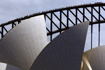 Arch of the Sydney Harbour Bridge behind the Sydney Opera House 