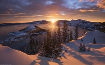 Arclight - A Winter Sunrise at Crater Lake Oregon by Alex Noriega 