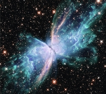 At the end of their lives Sun-like stars shed layers of hot gas To investigate how these ethereal clouds develop Hubble took new colorful images of two nearby planetary nebulae including this picture of the Butterfly Nebula 