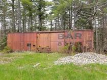 Bangor and Aroostook Railroad  refrigerator boxcar in the Maine woods