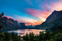 Beautiful colorful sunset over St Mary Lake and wild goose island in Glacier national park 