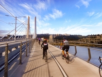 Bicyclists on the new Tilikum Crossing transit bridge Portland Oregon 