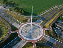 Bike roundabout above busy car intersection NL 