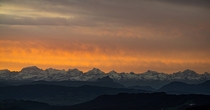 Blazing sunrise over the Swiss Alps  larsgebraad