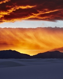 Blazing sunset over white sand dunes New Mexico 