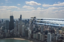 Blue Angels honored frontline COVID- first responders and essential workers with formation flight over Chicago on May  