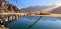 Bridge across the Saltoro River Pakistan  by Yury Pustovoy 