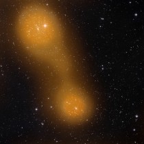 Bridging Cities of Galaxies Abell  lower center and Abell  top left are about a billion light-years from Earth and the gas bridge extends approximately  million light-years between them 