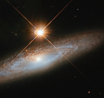 Bright foreground star isnt enough to distract from the grandeur of the galaxy UGC  captured here by the NASAESA Hubble Space Telescope While this foreground star is incredibly bright to