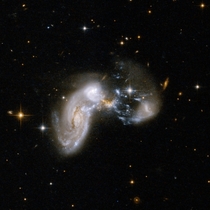 Bursting with Stars Starburst Galaxy Zw II  