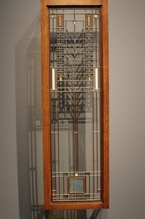 Casement window Frank Lloyd Wright design c  Leaded glass panes in metal frame Linden Glass Company maker Made for Darwin D Martin House Buffalo New York  Displayed in Cleveland Museum of Art
