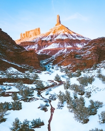 Castleton Tower centerpiece of Castle Valley Utah Love the contrast of winter on these red rocks 