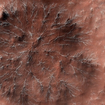 Channels created by carbon dioxide frost on Mars