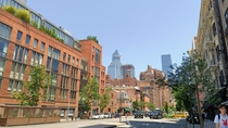 Chelsea NYC th and th towards Hudson yards and the Edge beautiful summer weather in town today