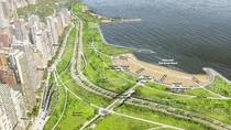 Chicago is planning major changes to Lake Shore Drive Part of Lake Michigan will be filled in to straighten out a tight bend and provide more park space New grade separated crossings will be provided for pedestrians and cyclists And the at-grade intersect