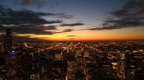 Chicago That moment when its nighttime on the ground but sunset on the th floor of the AON- and when the building lights blur into those of the horizon  West view of my old office