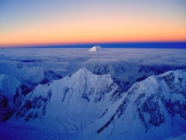 Chogolisa above the clouds at  feet - Gilgit-Baltistan Pakistan - Aitor Las Hayas 