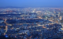 Cityscape of downtown Seoul South Korea seen from Mt Inwang with Gyeongbok Palace in the middle 